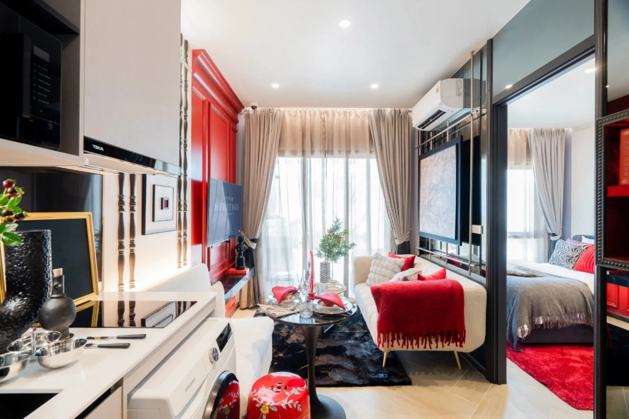 One-bedroom show unit with red accents